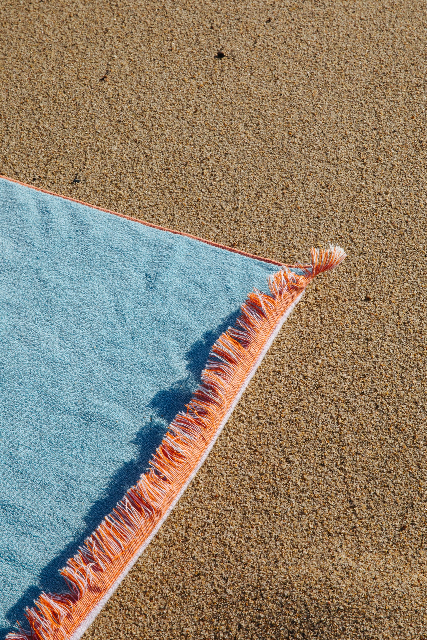 Artistic detail photo of the fringe border of the towel